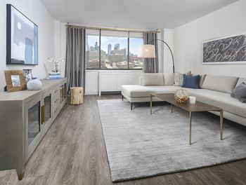 Contemporary living room with city skyline view